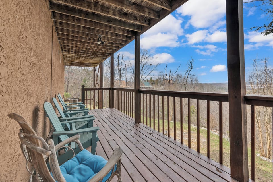 Wrap around decks with multiple seating areas, grill, and hot tub