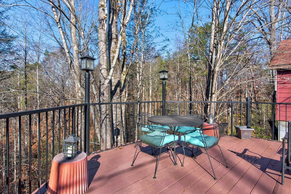 Expanded deck with outdoor seating, and wood burning stove