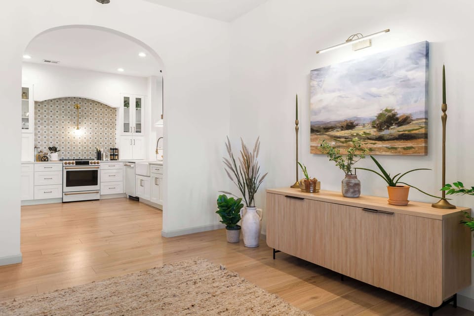 The elegant kitchen offers ample space & all the comforts of home