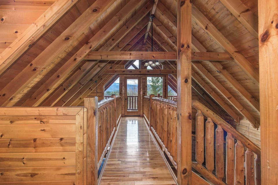 Gorgeous treetop views await at the end of the loft’s catwalk