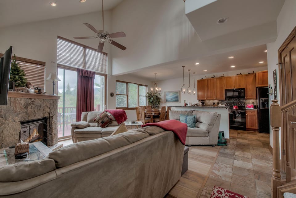 Living room with gas fireplace and flat screen TV
