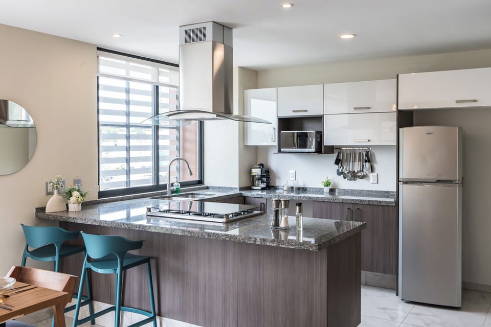 Deluxe Apartment, 3 Bedrooms, Balcony | Private kitchen | Full-size fridge, microwave, oven, stovetop