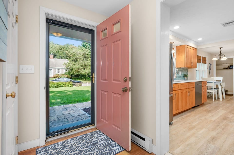 Enter into an open concept, one floor living home with lower level entertainment room