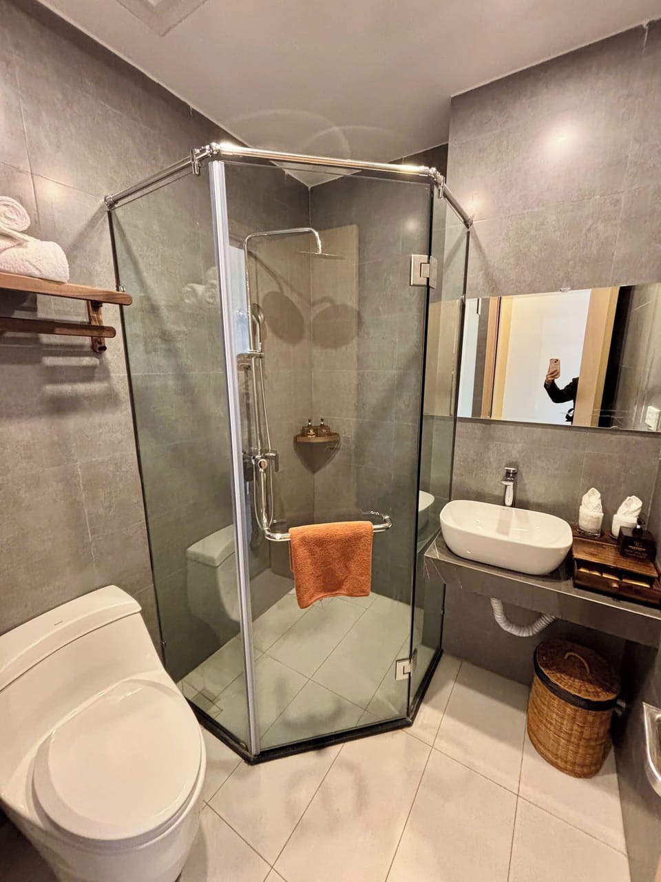 Shower, hair dryer, slippers, towels