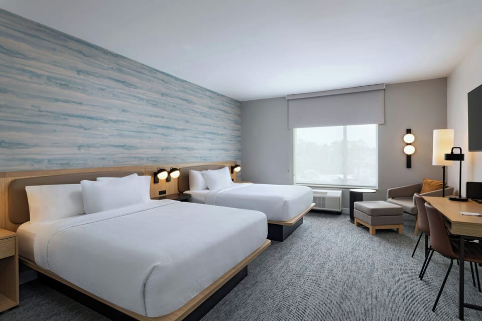 Standard Room, 2 Queen Beds | Desk, laptop workspace, WiFi (free), bed sheets