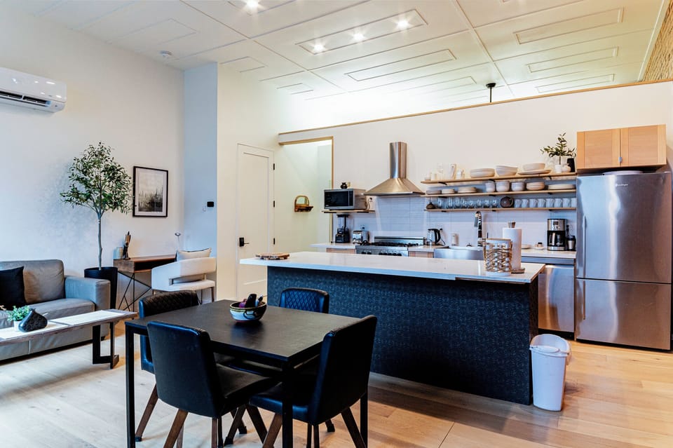 Open concept dining, kitchen and living room area