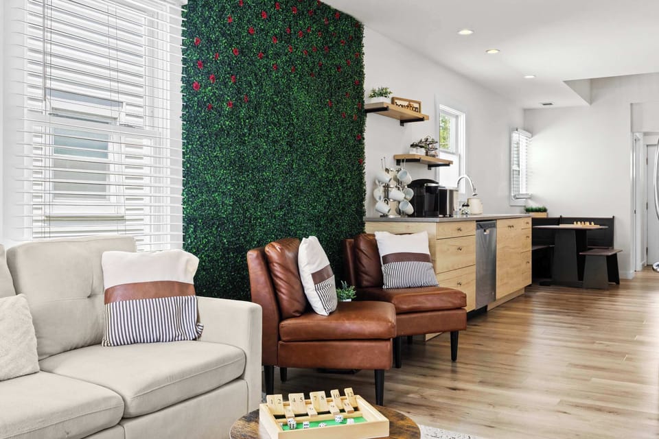 Living Room: Cozy comfort meets modern style — unwind in this bright and inviting Airbnb living room, perfect for relaxing after a day of exploring.