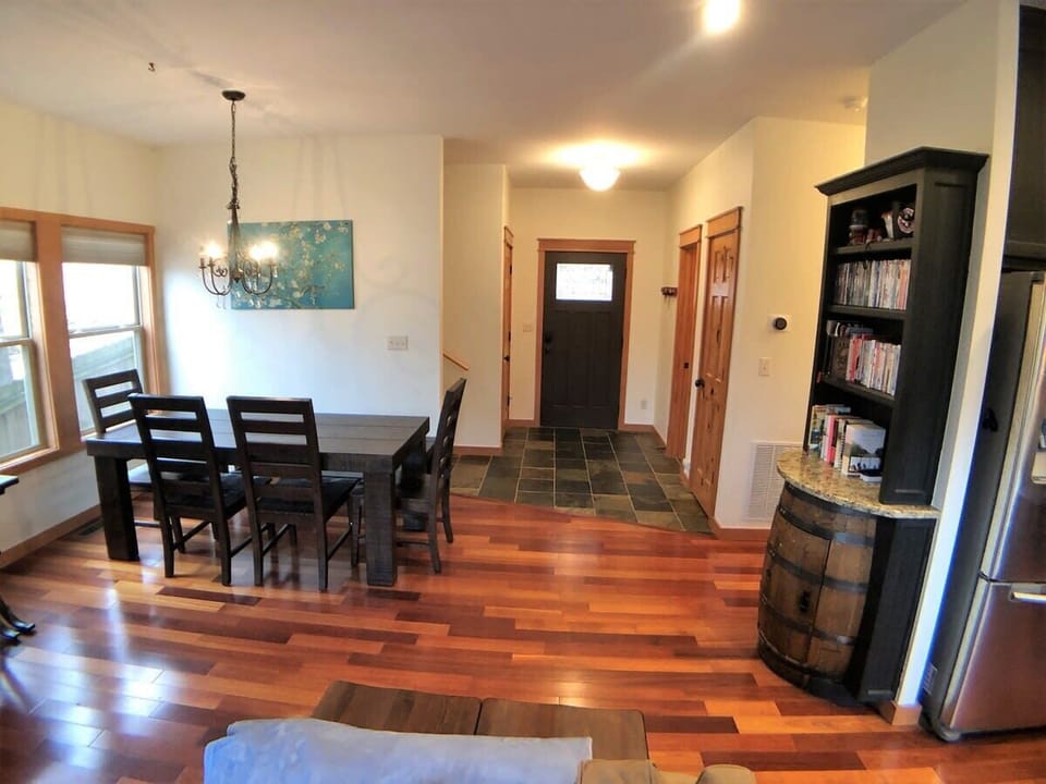 Entry leads to kitchen and dining room