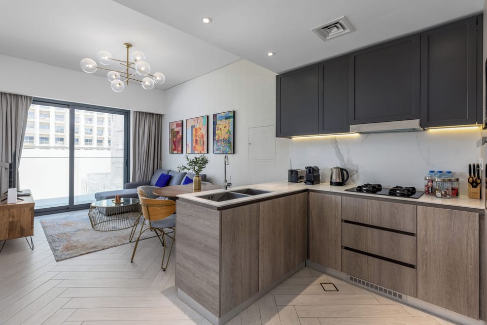 Deluxe Apartment, Balcony, City View | Living area | Flat-screen TV