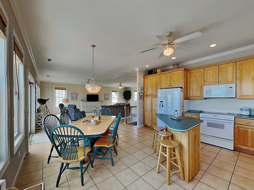 Fully Equipped Kitchen + Dining Area