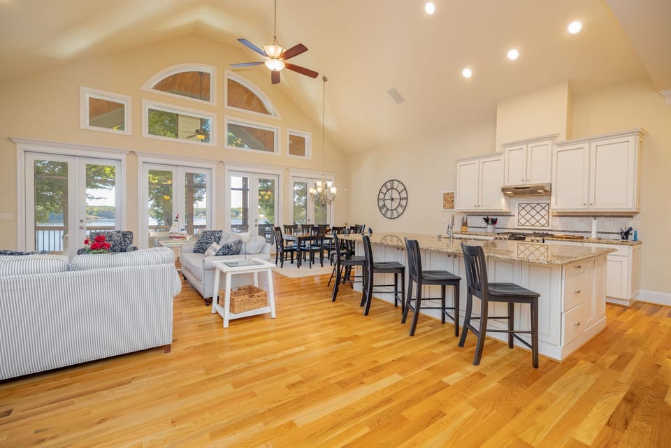 Open Family, Kitchen, and Dining with add. dining outside on Screened Porch