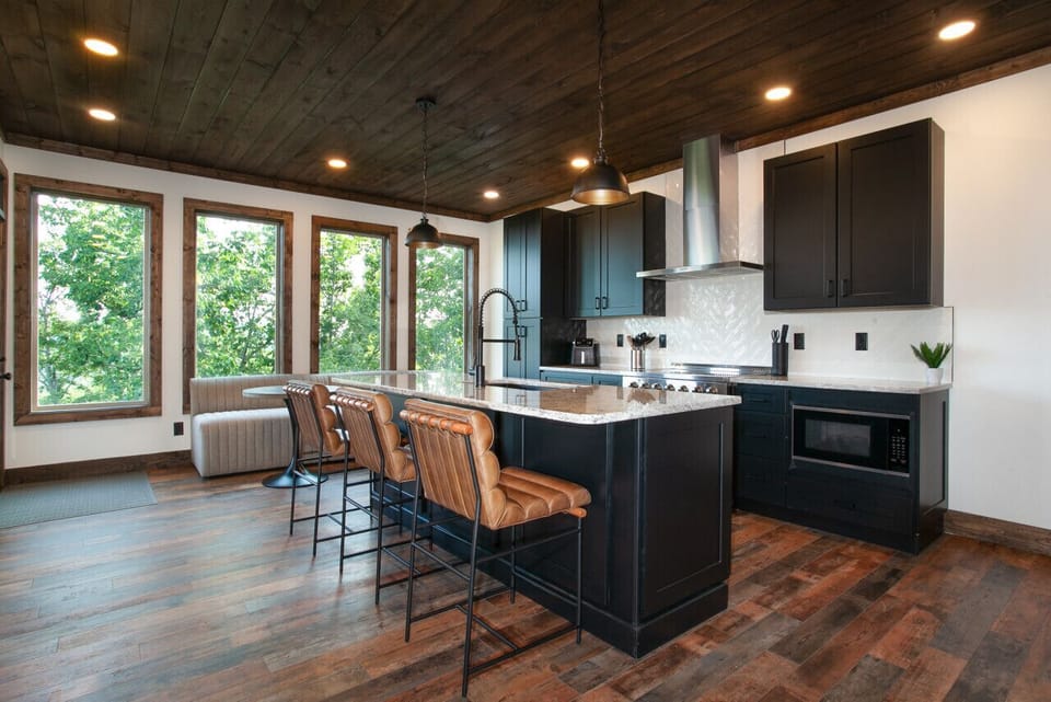 The heart of the home, designed with sophistication. Ample seating, rich tones, and a layout perfect for gatherings.