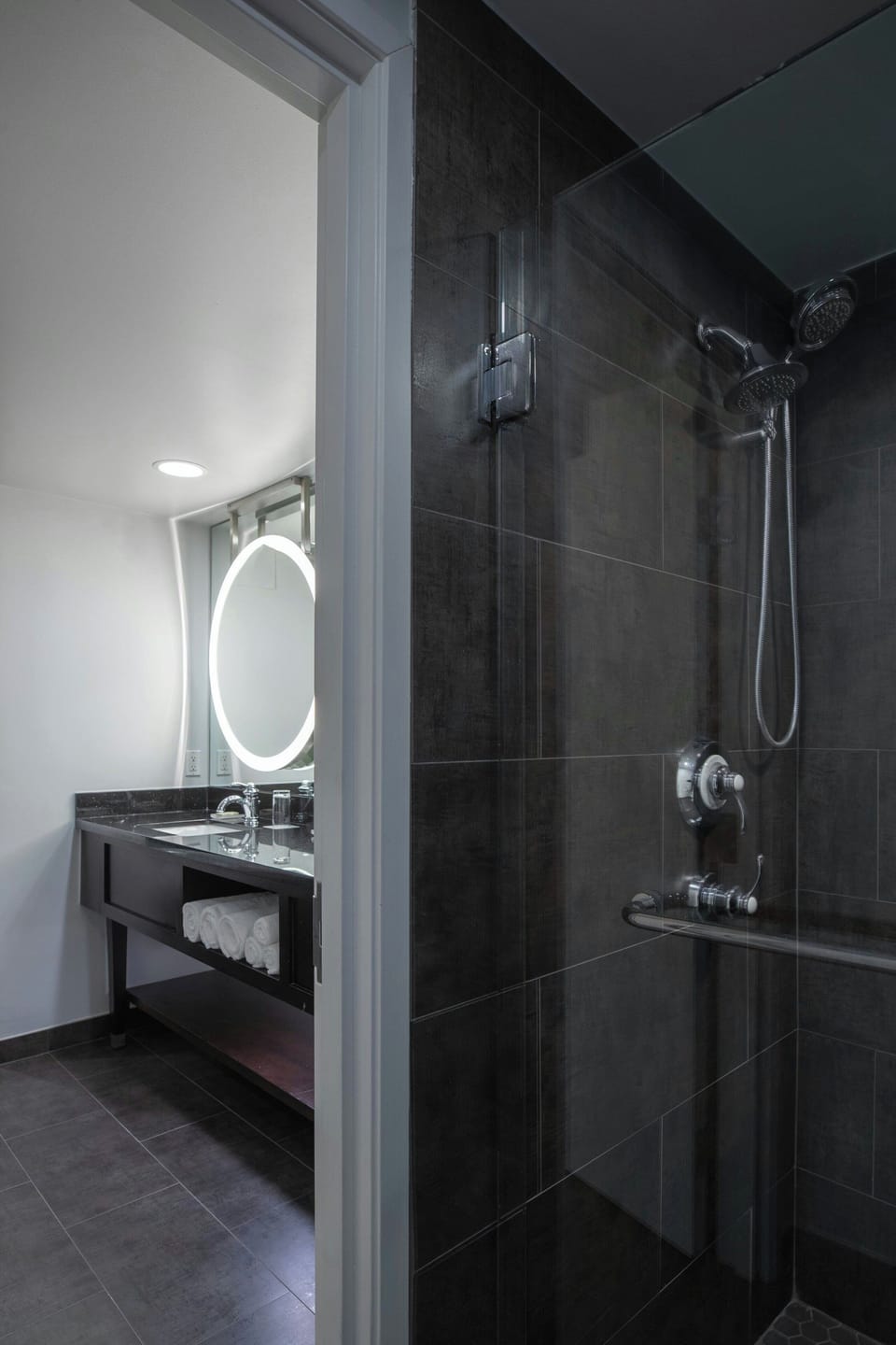 Designer toiletries, hair dryer, towels