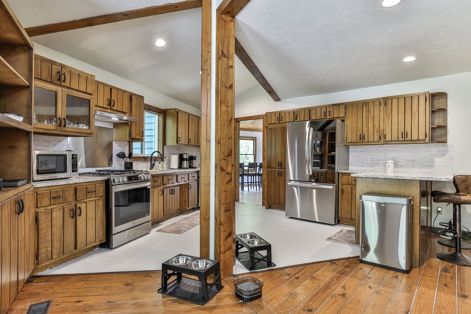Our smart LG kitchen might have an octagon shape, but that’s never stopped us from finding the perfect spot for a dog feeding station (or two)! And honestly — that no-spill water bowl? Best invention since sliced bread.