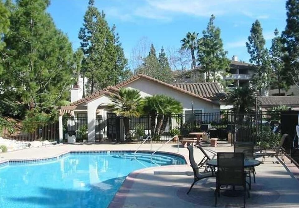 One of two swimming pools. Clubhouse in the background.