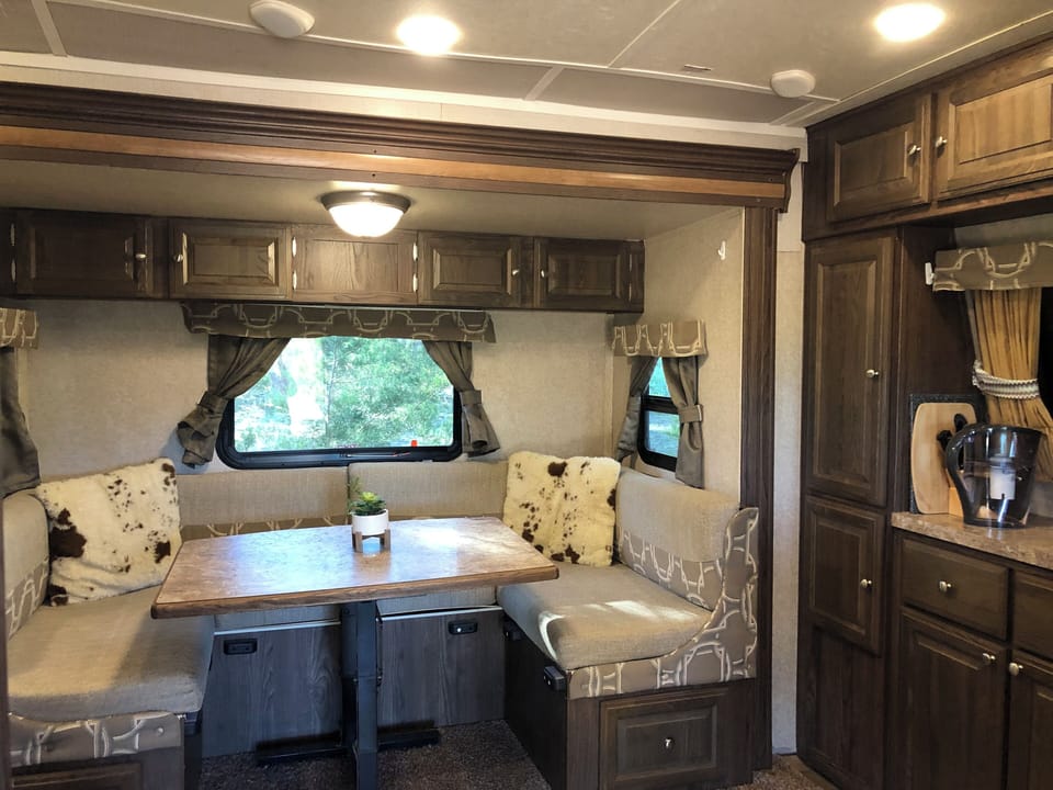 Banquette seating off the full kitchen