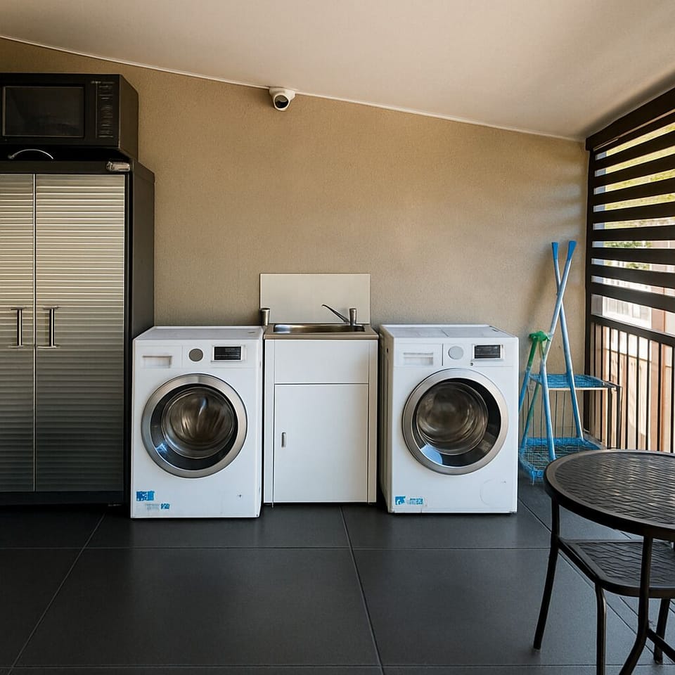 Shared Laundry Area: Washer available for convenient laundry needs