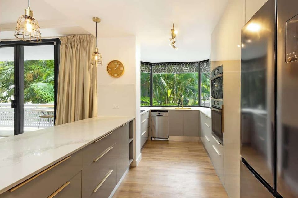 Prepare everything from a quick breakfast to a leisurely dinner in the contemporary kitchen, where generous bench space and quality appliances make cooking a pleasure.
