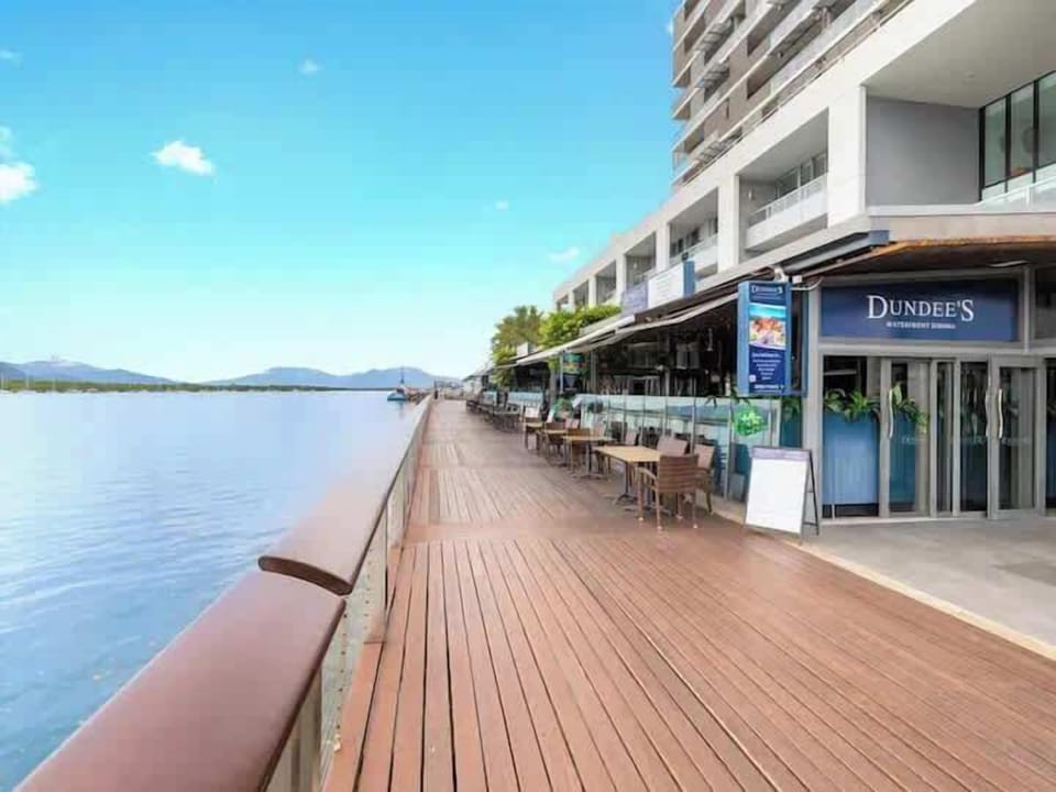 Just moments away, the waterfront boardwalk invites morning walks, marina dining, and easy access to reef adventures.