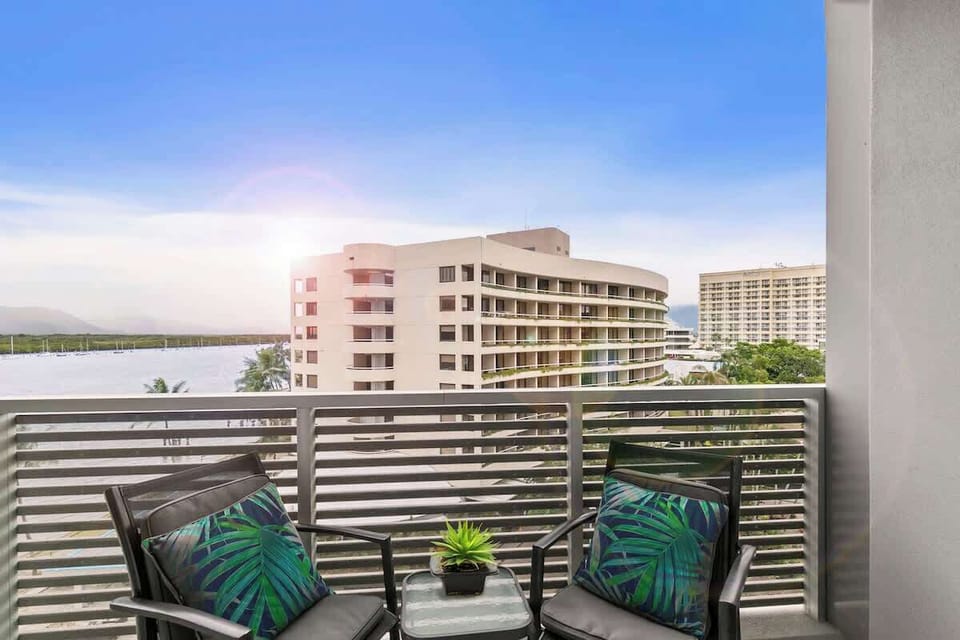 Watch the marina come to life from your private balcony, where seating for two creates the perfect setting for morning coffee or sunset drinks.