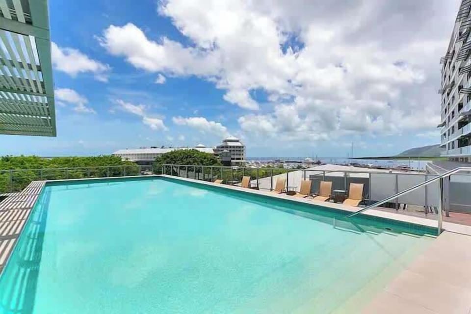 Cool off in the shared pool or relax poolside beneath the tropical sunshine after a day of sightseeing.
