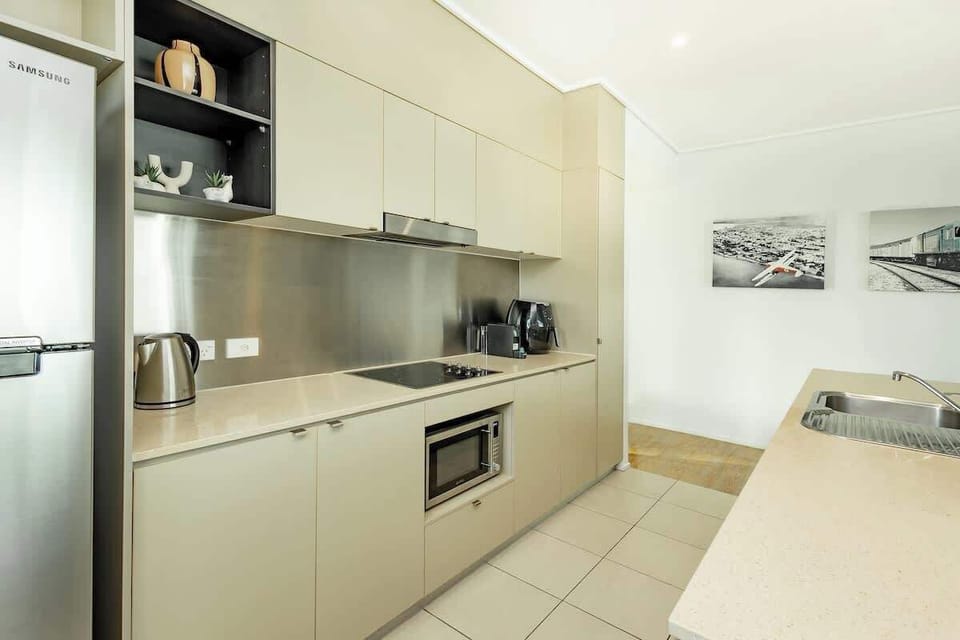 Prepare meals with ease in the streamlined kitchen, complete with modern appliances, generous bench space and everything needed for a comfortable self-catered stay.