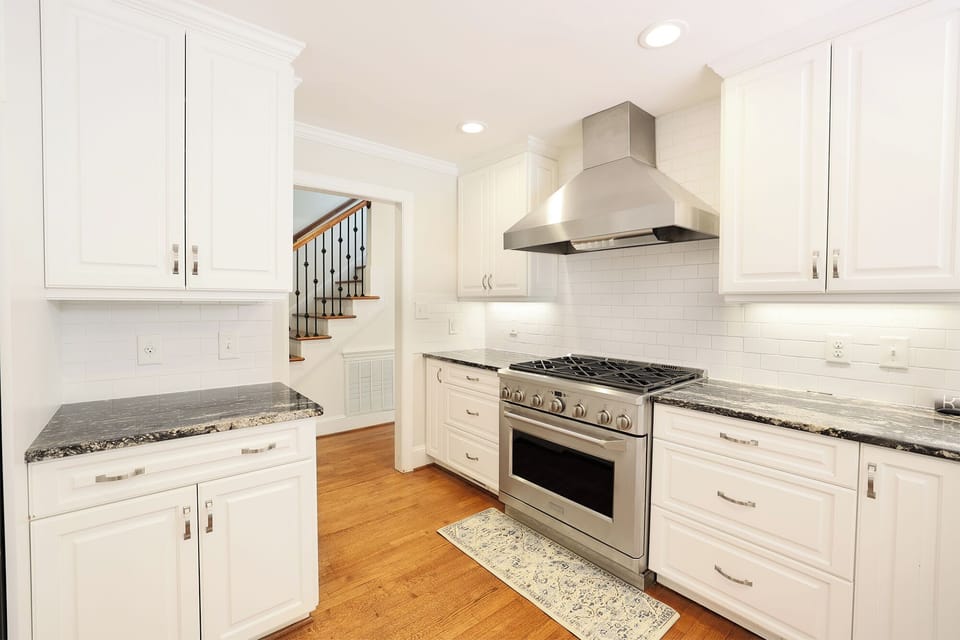Kitchen- Gas stove, stainless steel appliances, granite countertops