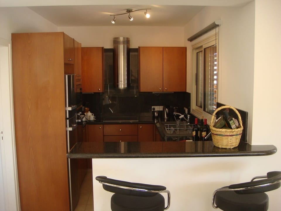 Kitchen with all appliances. Taken c 2012 (but has not changed since)