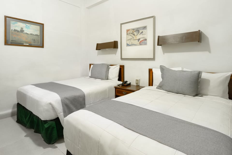 Standard Room, 2 Double Beds | WiFi (free), bed sheets