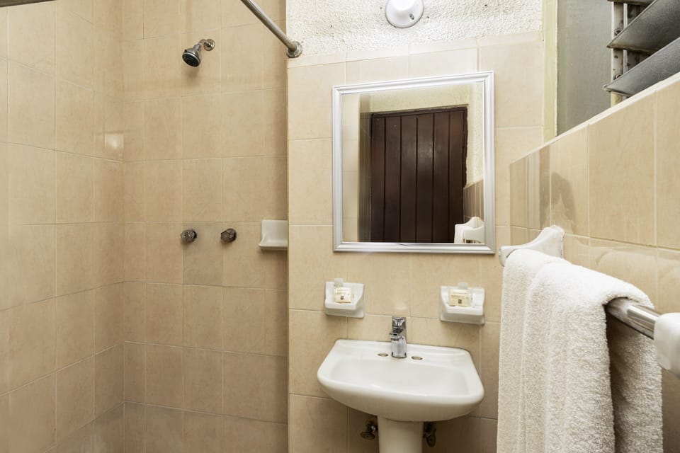 Shower, free toiletries, towels, soap