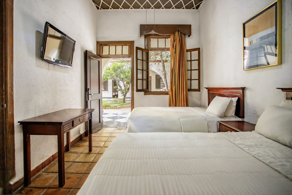 Standard Room, 2 Double Beds | Desk, iron/ironing board (on request), WiFi (free)