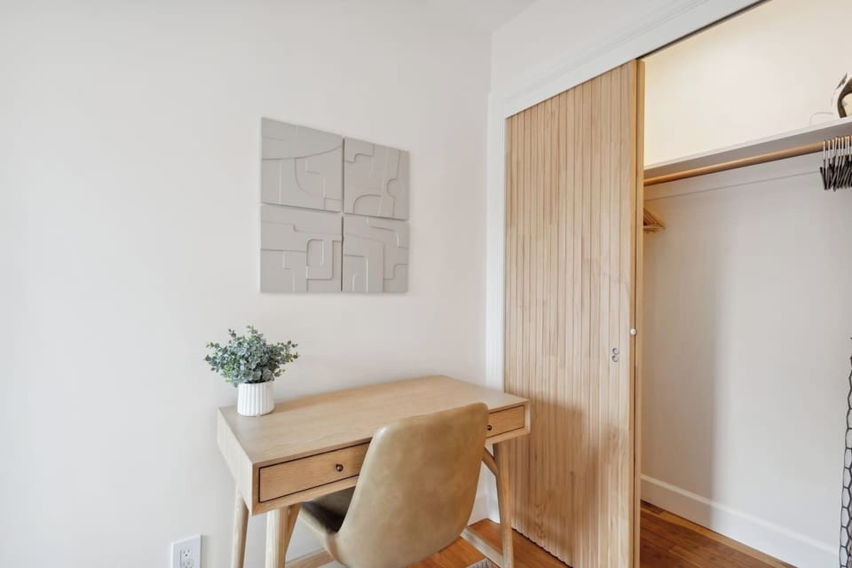 Bedroom with an designated working area, where you can focus and work efficiently if needed.