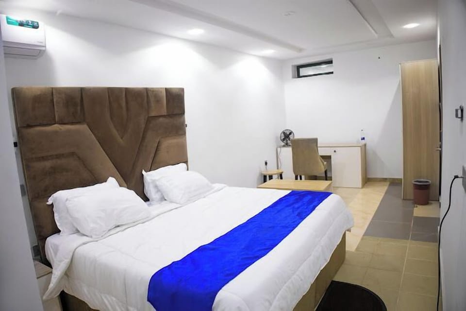 Comfort Room, Balcony, City View | Desk, laptop workspace, free WiFi