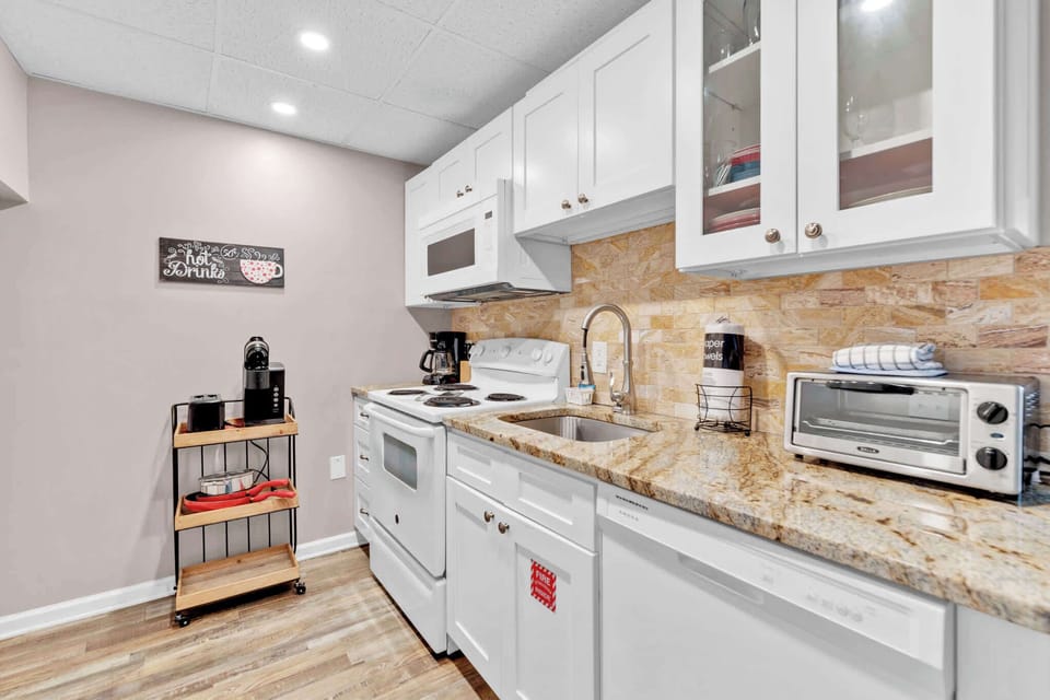 The open, airy kitchen offers ample space & all the comforts of home
