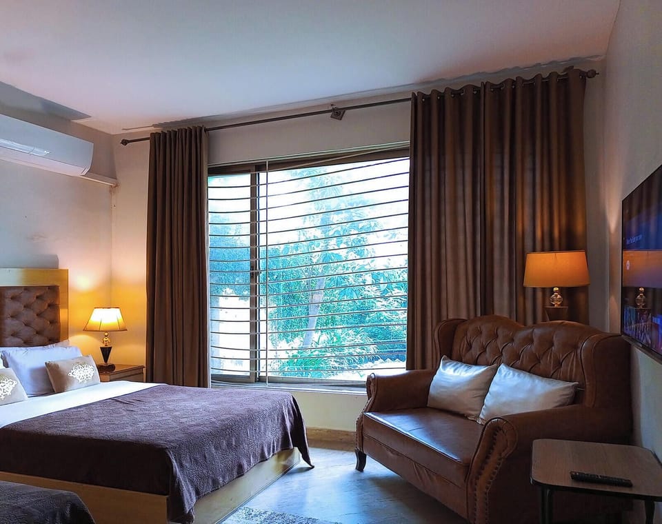 Deluxe Quadruple Room, 2 Queen Beds | Soundproofing, iron/ironing board, free WiFi