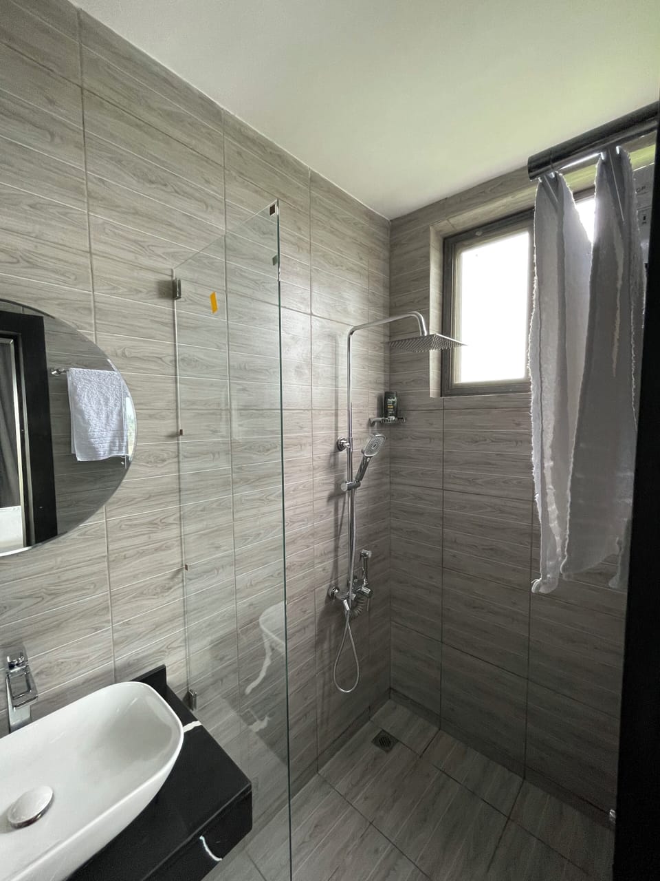 Shower, slippers, towels, shampoo