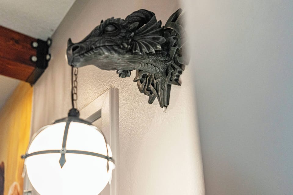 Experience the charm of the striking dragon head light fixture that brings whimsy to your room. Its soft glow creates a warm, inviting atmosphere ideal for relaxation and enjoyment.