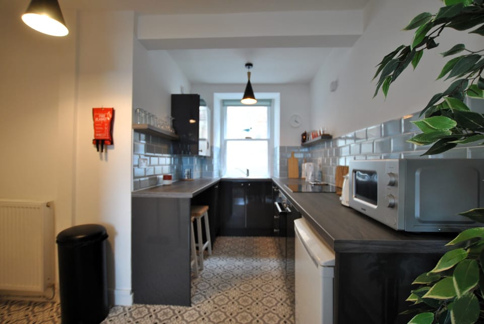 The modern kitchen is well-equipped