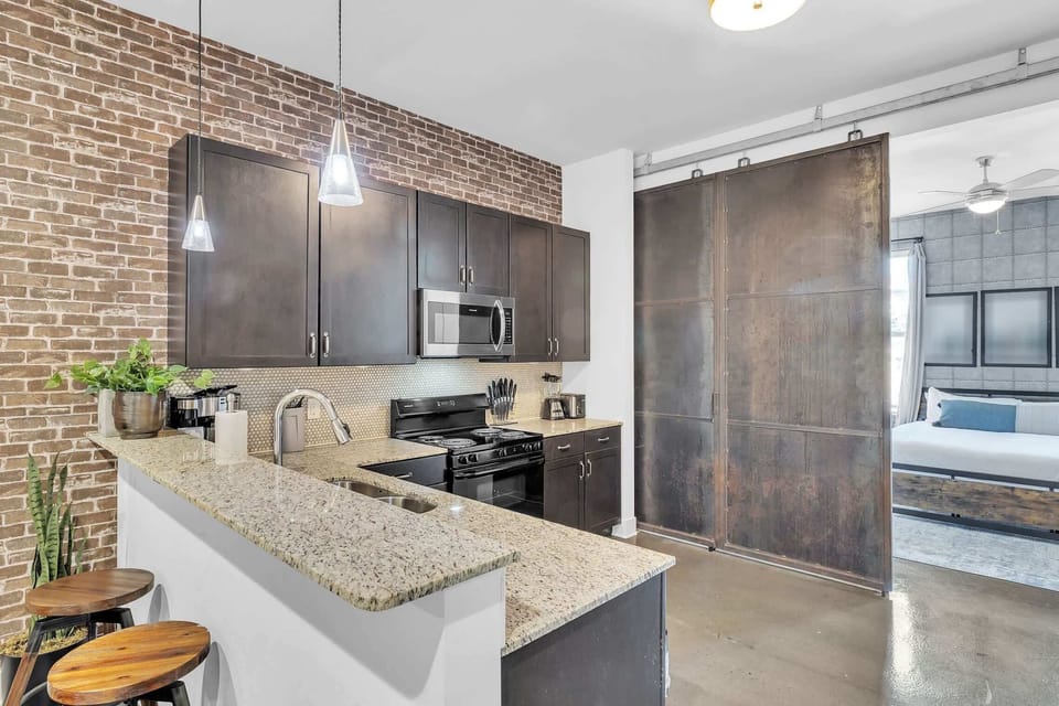 The contemporary kitchen provides generous space and all the comforts of home