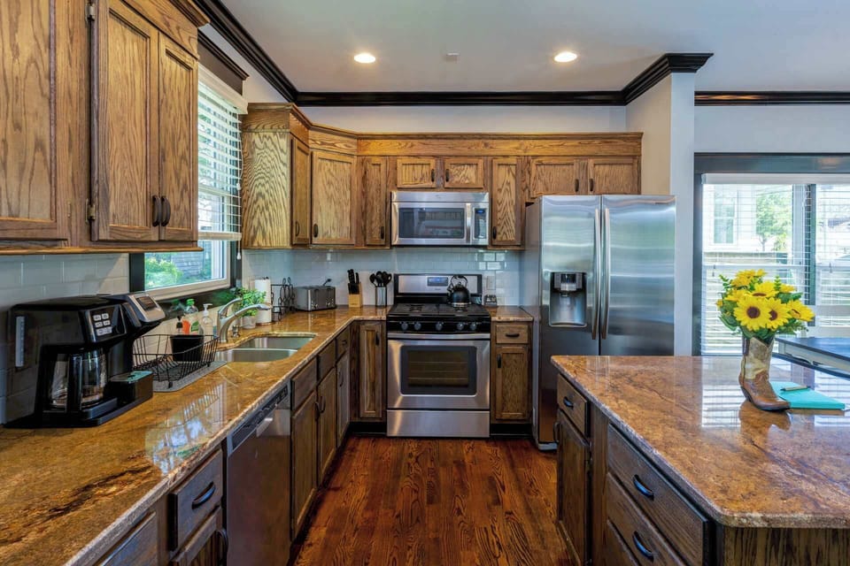 Sprawling counterspace and excellent amenities provide the ideal place for gathering and preparing meals together