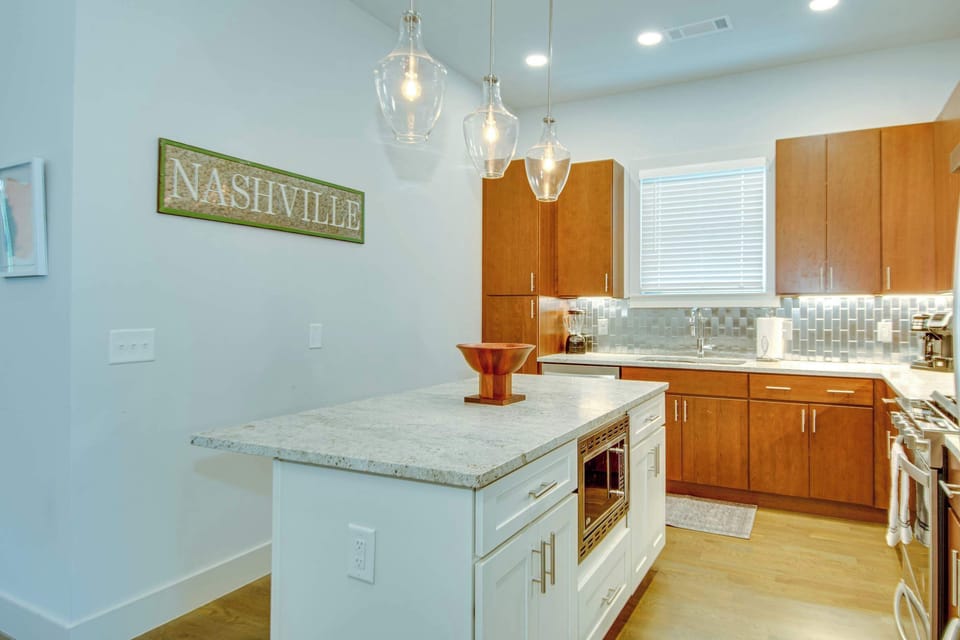 Kitchen with toaster, coffee maker, blender, and more