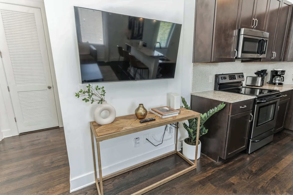 Unwind in the chic living room while you stream your favorites on the smart TV