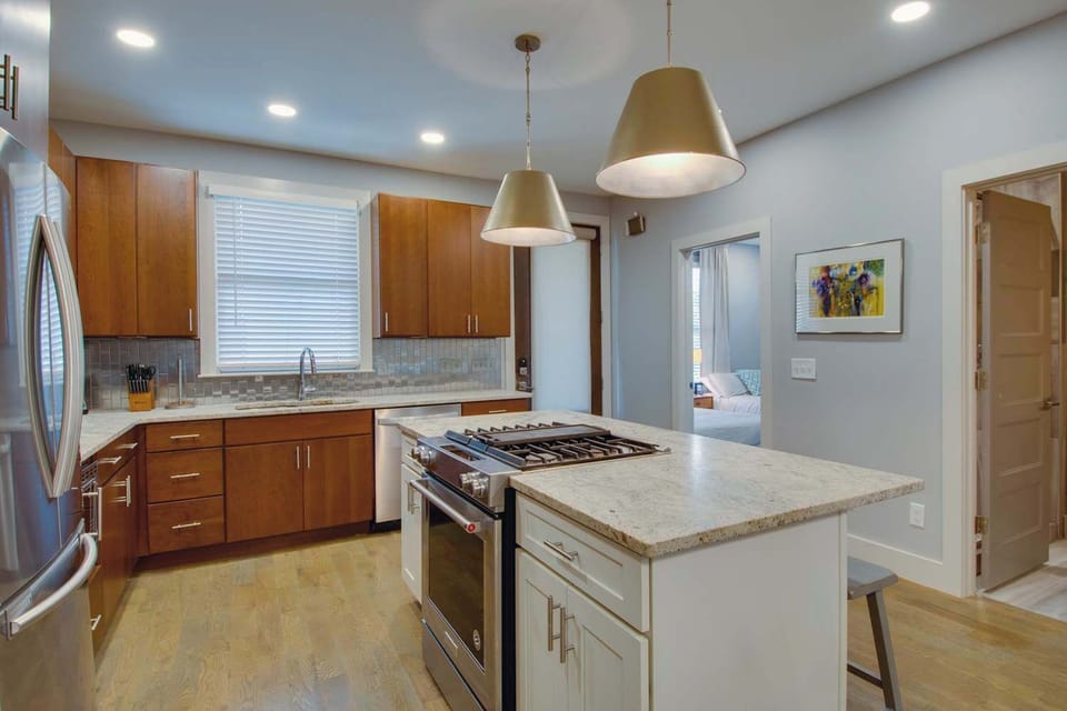 Full kitchen with stainless steel appliances