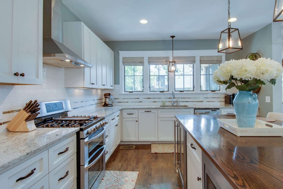 Kitchen with drip coffee maker, toaster, blender, stand mixer, and more