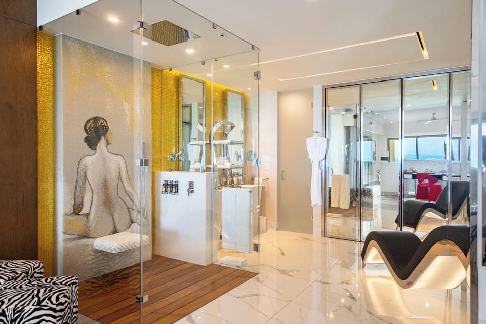 Shower, rainfall showerhead, designer toiletries, hair dryer