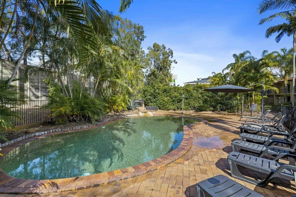 Relax poolside on the brick-paved deck, with plenty of loungers and shade to choose from.