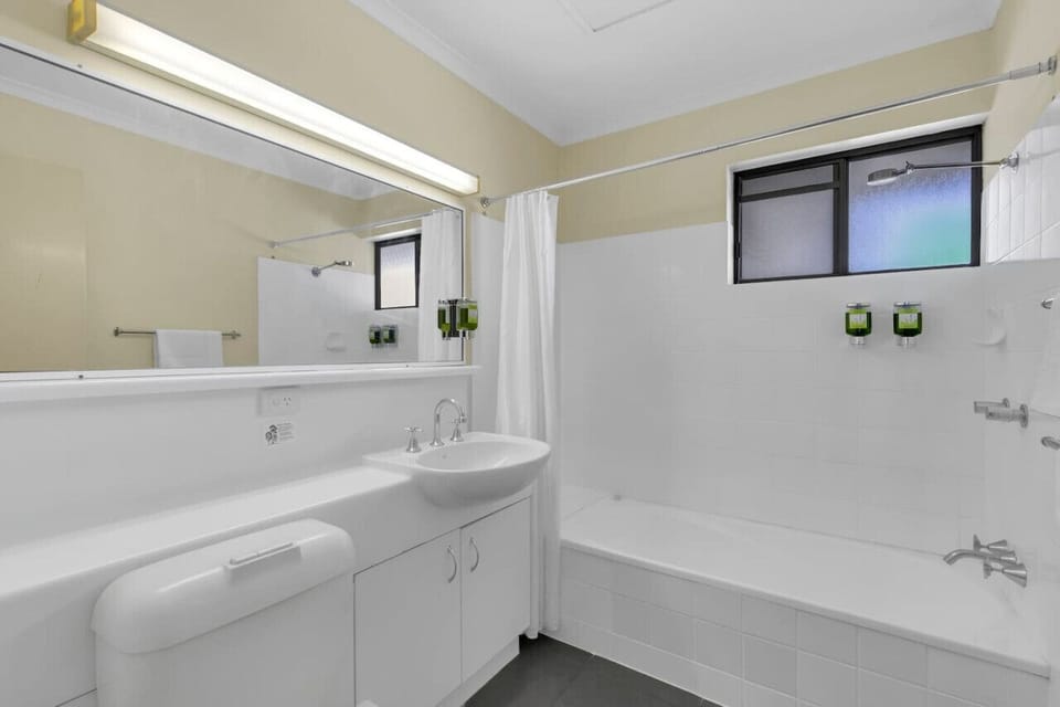 Bathroom with sink and bathtub