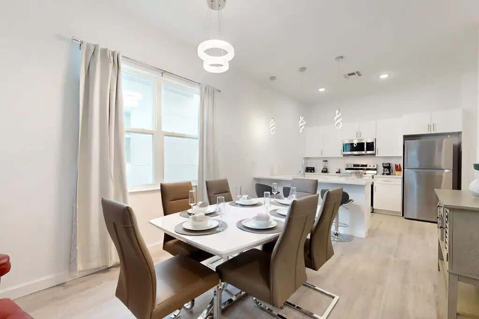 Enjoy meals together in the stylish dining area, perfect for family gatherings.