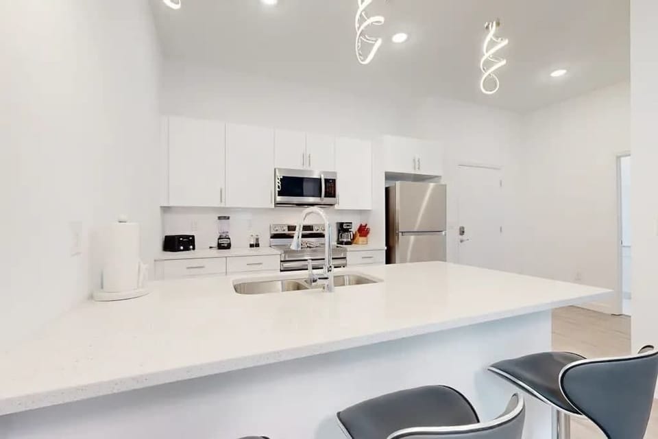 Cook up a storm in the fully equipped kitchen, complete with modern appliances and all the tools you need.