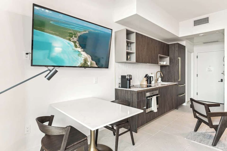 Cozy condo with a comfy sofa bed, king-size bed, kitchen, and smart TV for your perfect getaway.